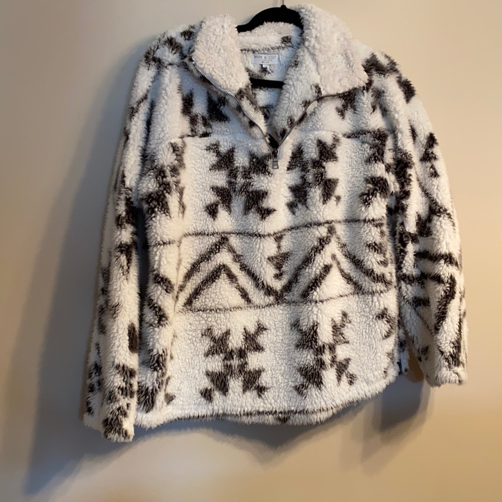 White and black quarter zip sweater